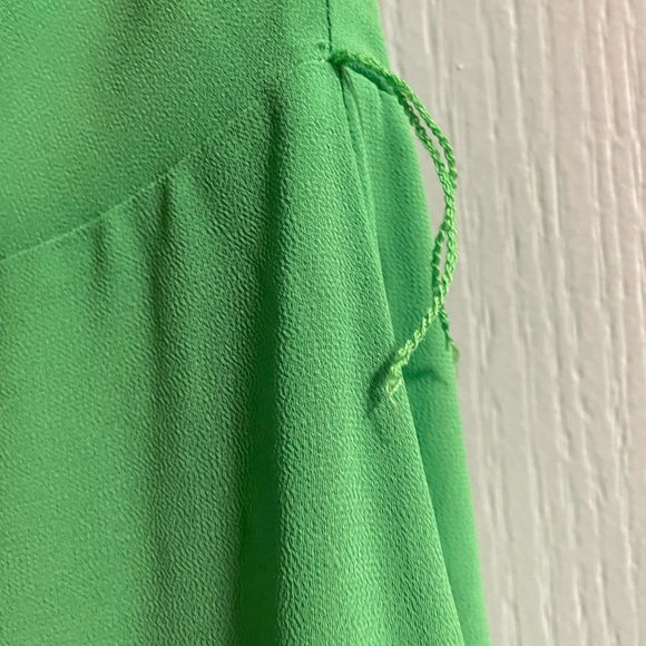 Belle Badgley MischkaMalia Halter
Neckline A-Line Midi Dress - Picture 6 of 6